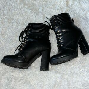 High heeled combat boots